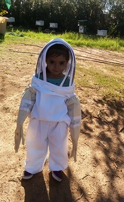 Rosie on the House child in bee suit