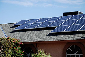 rosie on the house solar panel