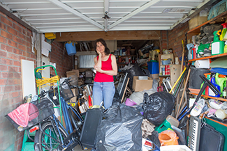 Rosie on the House Woman In Cluttered Garage